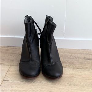 Tom’s black booties